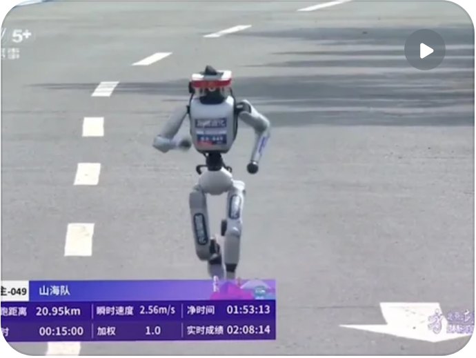 Humanoid robot crossing the half-marathon finish with live race stats